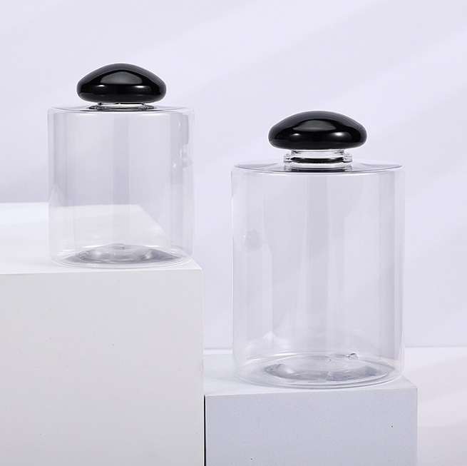 two bottles with black cap closure