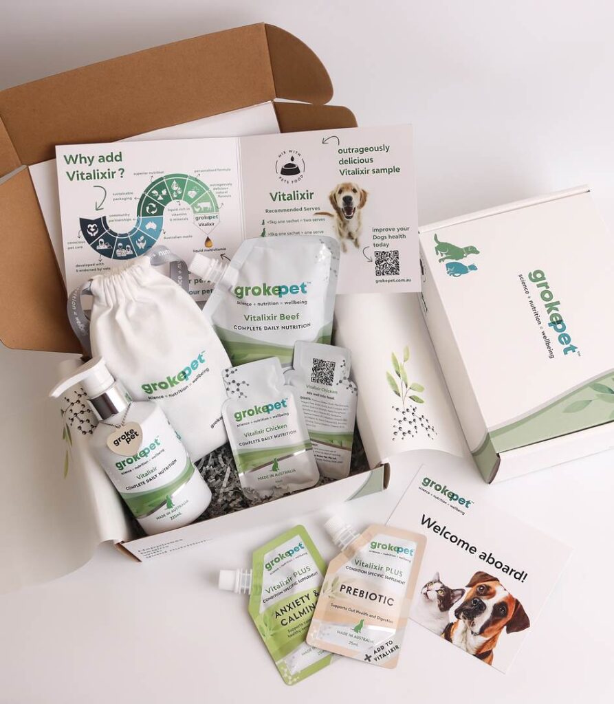 Custom pet packaging set for Groke Pet, including printed tissue paper, branded boxes, product sachets, and thank-you cards designed to enhance the unboxing experience.
